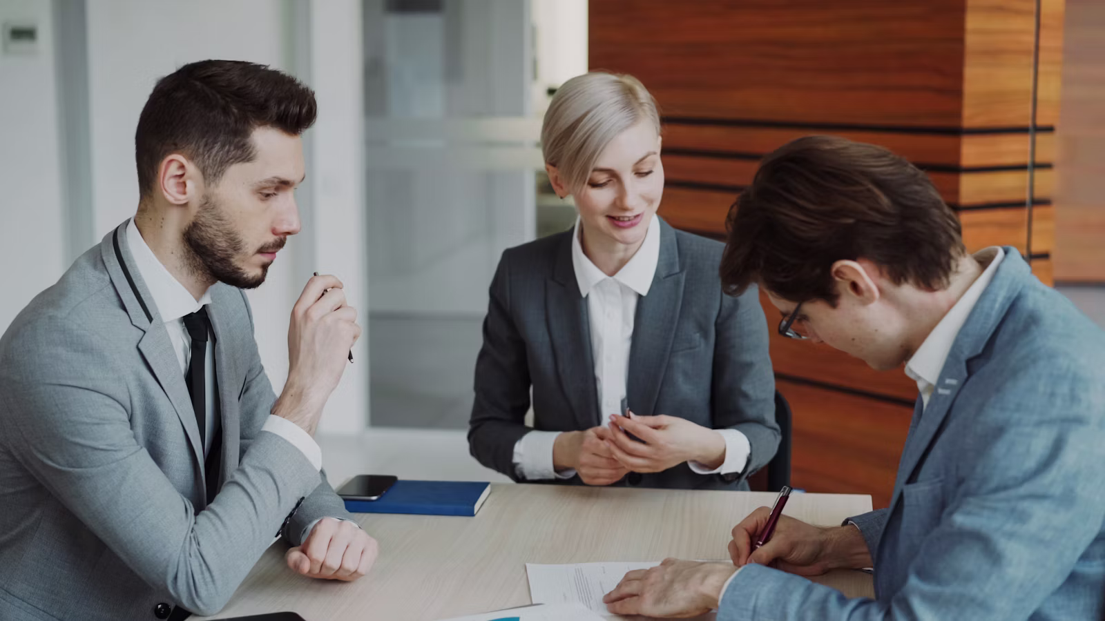 Woman Approving Papers for First Time Home Buyer Idaho